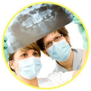 dentist looking x-ray image
