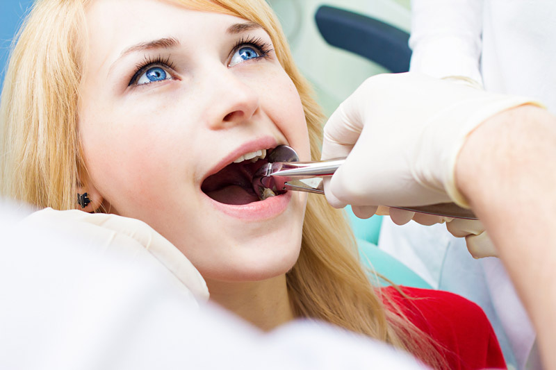 Symptoms of an Impacted Wisdom Tooth