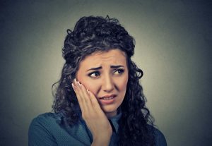 Do Your Teeth Hurt When Chewing? Here's Why…